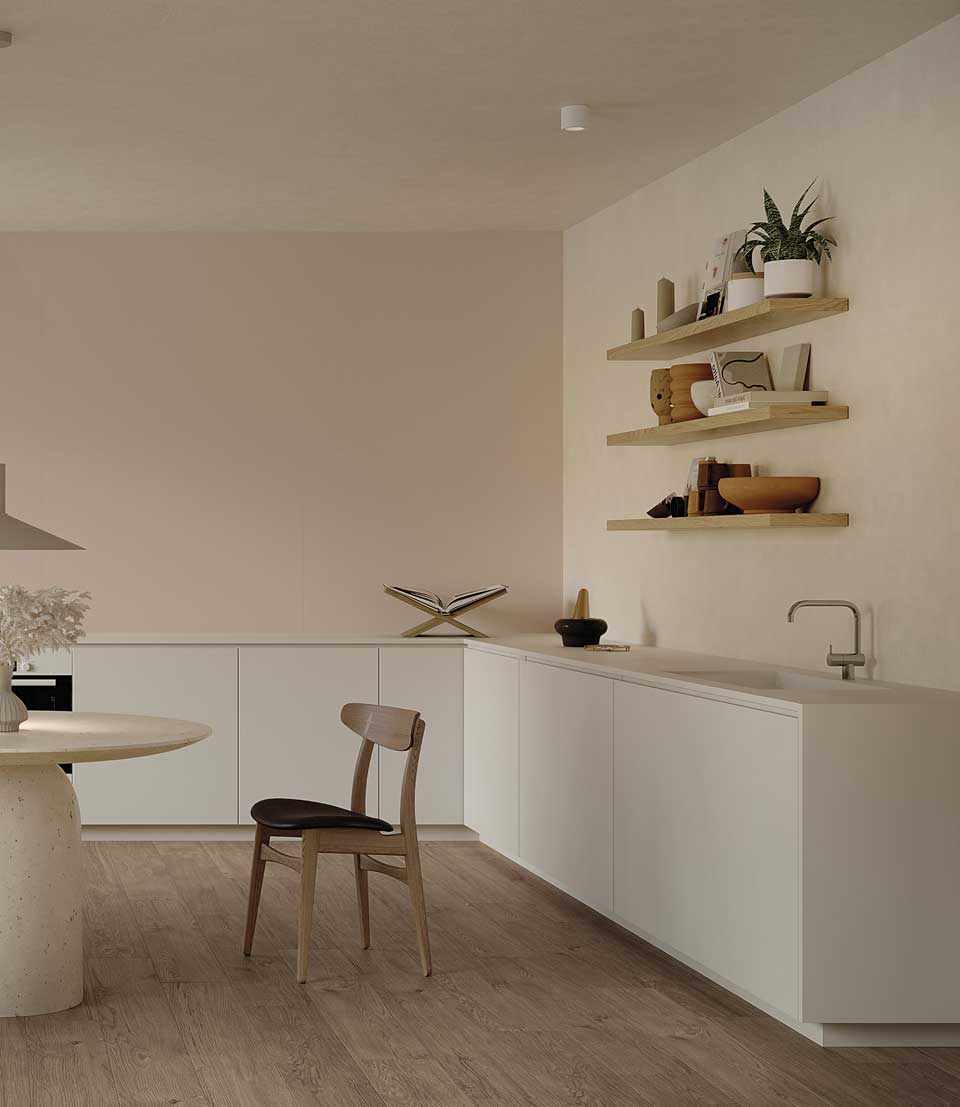 Minimal kitchen with wood effect floor, opaque white cabinets, wooden shelves and ceramic decorations.