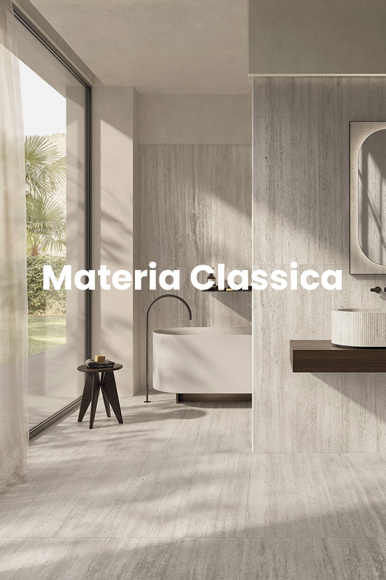 Elegant bathroom with light gray travertine-effect wall tiles, striped ceramic sink, and dark wood furnishings.