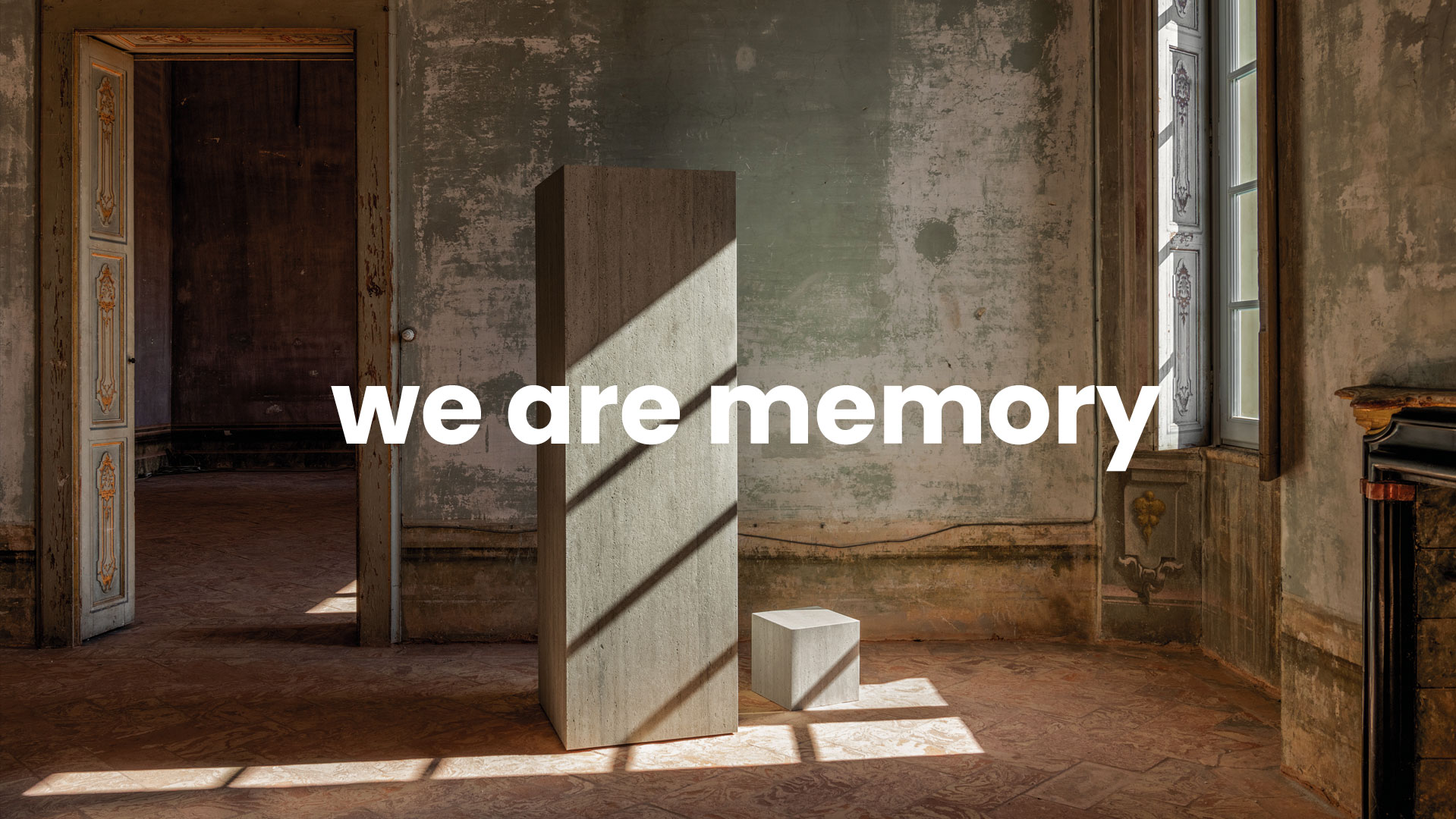 Art installation in a historic setting with stone columns and natural light, on antique terracotta flooring.